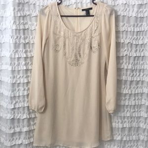 Cream dress with beaded embellishment